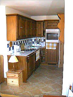 Kitchen area of rental apartment Bergerie F8, Les Allues