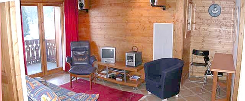 Living area of self catered rental apartment Bergerie B1, Les Allues with views towards Mont Vallon