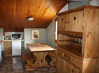 Kitchen - dining area of Alpinea E6, self catered rental apartment in Meribel Mottaret