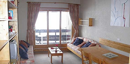 Living area of self catered rental apartment Arpasson 60, overlooking the piste in Meribel Mottaret