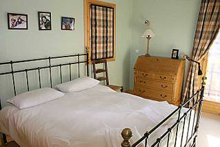 Double bedroom of self catered rental accommodation Chalet Petit Bercy, Meribel 1600