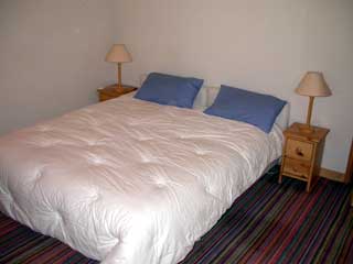 Master bedroom of self catered rental apartment Chardon Bleu 41, Meribel Centre