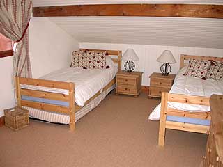Twin bedroom of self catered rental Chalet Cigales, Meribel 1600