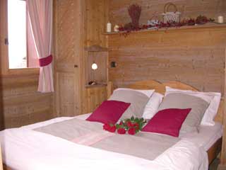The king size bed in the second double bedroom of self catered rental apartment, Meribel Vi