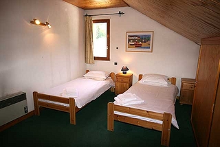 Top floor bedroom 1 of self catered rental property Chalet La Montee, Meribel Centre