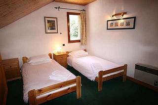 Top floor bedroom 2 of self catered rental property Chalet La Montee, Meribel Centre